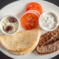 Gyro Platter · Marinated beef, chicken, or lamb served with feta cheese, olives, and tzatziki sauce.