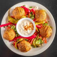 Falafel Platter · Mashed chickpeas and fava beans deep-fried, tahini.