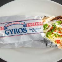 Gyro Sandwich · Choose beef , lamb , or chicken Served with lettuce, tomato, onions, and tzatziki sauce.
