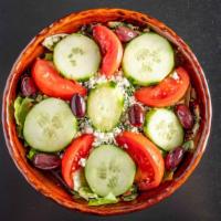 Feta Cheese Salad · Topped with cucumbers, tomatoes, Kalamata olives, feta cheese.