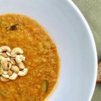 Mulligatawny · A spicy addictive Anglo-Indian red lentil and quinoa soup; infused with fennel, cumin, carda...