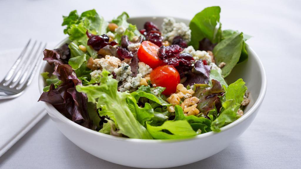 California Salad · All-natural turkey, crispy bacon, spinach, romaine lettuce, mushrooms, cherry tomatoes, cucumber, and egg whites, mixed with blue cheese dressing.