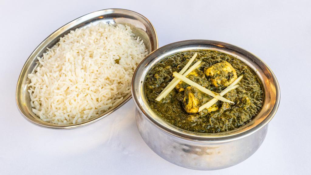 Palak Paneer · Vegan, gluten free. Fresh baby spinach and cubes of cottage cheese cooked with onions, ginger, garlic and cilantro.