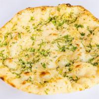 Garlic Naan · Leavened flour bread with fresh garlic.