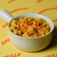 Classic Cheddar Mac · (16 oz) Classic cheese sauce with tender elbow pasta. Baked. We give it a chef's K.I.S.S..

...