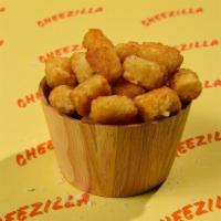 Tater Tots · Grated potatoes formed into small cylinders and deep-fried

From the moment you order it wil...