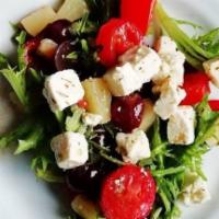 Greek Salad · Romaine lettuce, tomatoes, cucumbers, onions, kalamata olives and feta cheese.