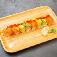 Beauty Roll · Spicy kani, cucumber inside, soybean wrapped, topped with salmon, mango and avocado with a s...
