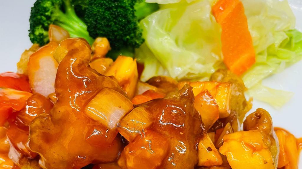 Sweet And Sour Crispy Chicken · Favorite. Crispy bite size pieces of chicken served with a tangy sweet and sour pineapple, tomato, and sweet pepper sauce.  Plates come with seasonal vegetables.  Includes choice of rice, red rice, spaghetti.