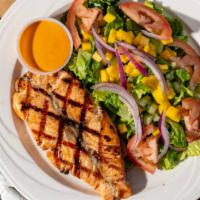 Grill Salmon · Salmon grilled to perfection with broccoli, carrots, or market vegetables.