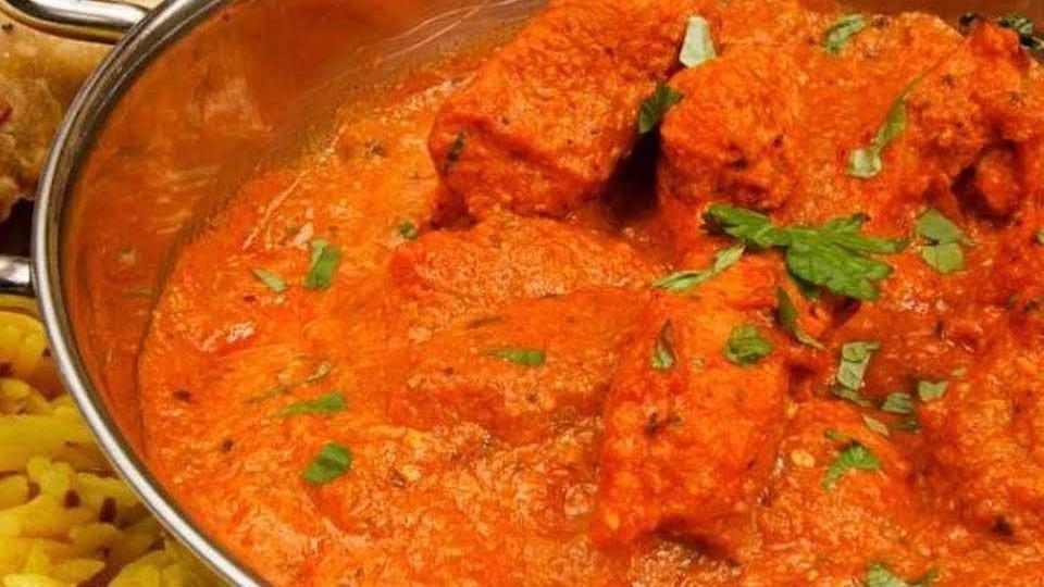 Chicken Tikka Masala · Diced chicken cooked in tomato and cream based sauce.