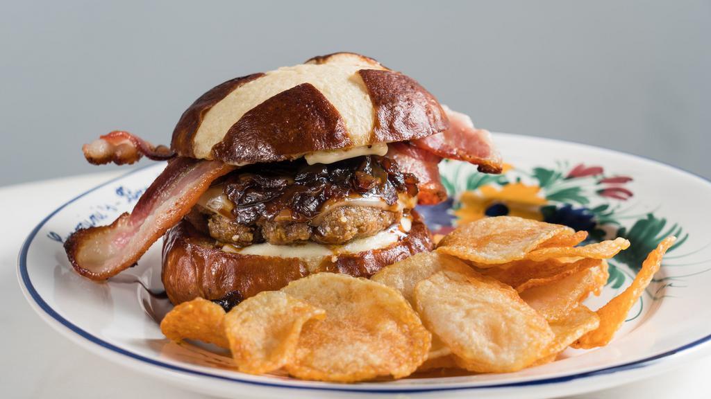 Elena'S Burger · 8 OZ. OF 3 SELECTED MEATS (pork, beef and chicken) WITH ASCOLANA OLIVES MINCED |  PROVOLONE CHEESE | BACON | CARAMELIZED ONIONS |  HOMEMADE MAYONNAISE | PRETZEL BUN