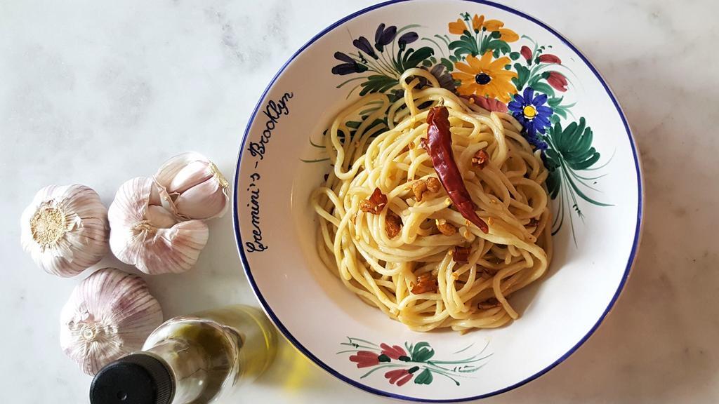 Aglio, Olio And Peperoncino (Garlic, Oil And Pepper) · Fresh pasta. With garlic, extra virgin olive oil, and red pepper