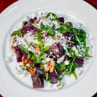 Organic Beet Salad · Gluten free. With walnut dressing and gorgonzola cheese.