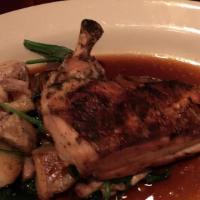 Roasted Organic Chicken · Gluten free. With sautée of chicken confit, red bliss potato and spinach.