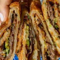 Beef Wrap · Slices of Beef Calf, Thinly Sliced Cucumber and Green Peppers in a Scallion Pancake Wrap, Dr...