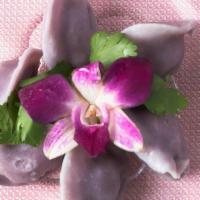 Pork Dumplings (Steamed) · Handmade Purple Yam Dumpling Wrap, Stuffed with Juicy Pork and Chinese Cabbage. 6 Pieces Wit...