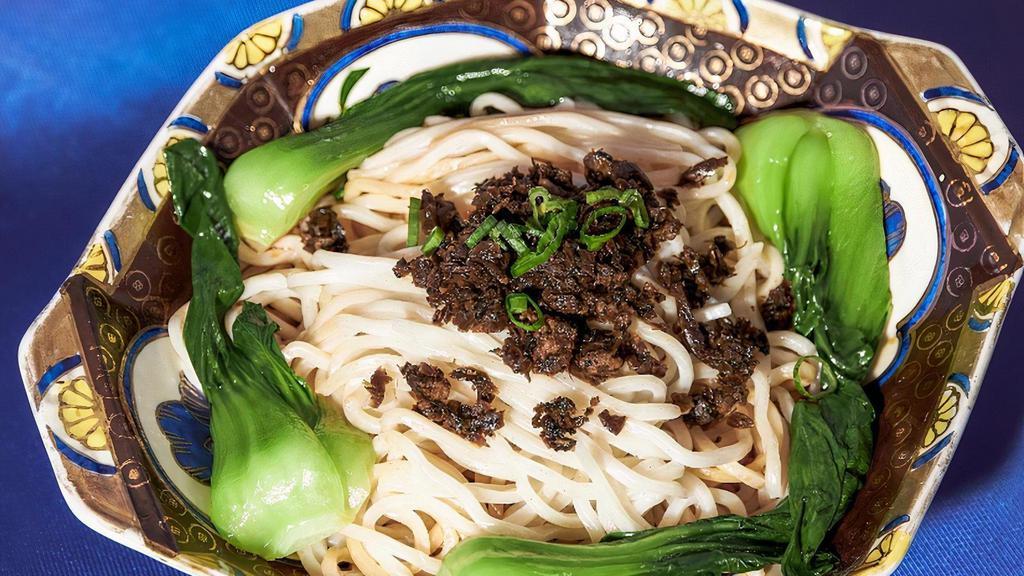 Dan Dan Noodle · Wheat Noodles Topped With Minced Pork, Pickled Vegetables, and Bok Choy in a Spicy, Tongue-Tingling Sauce
