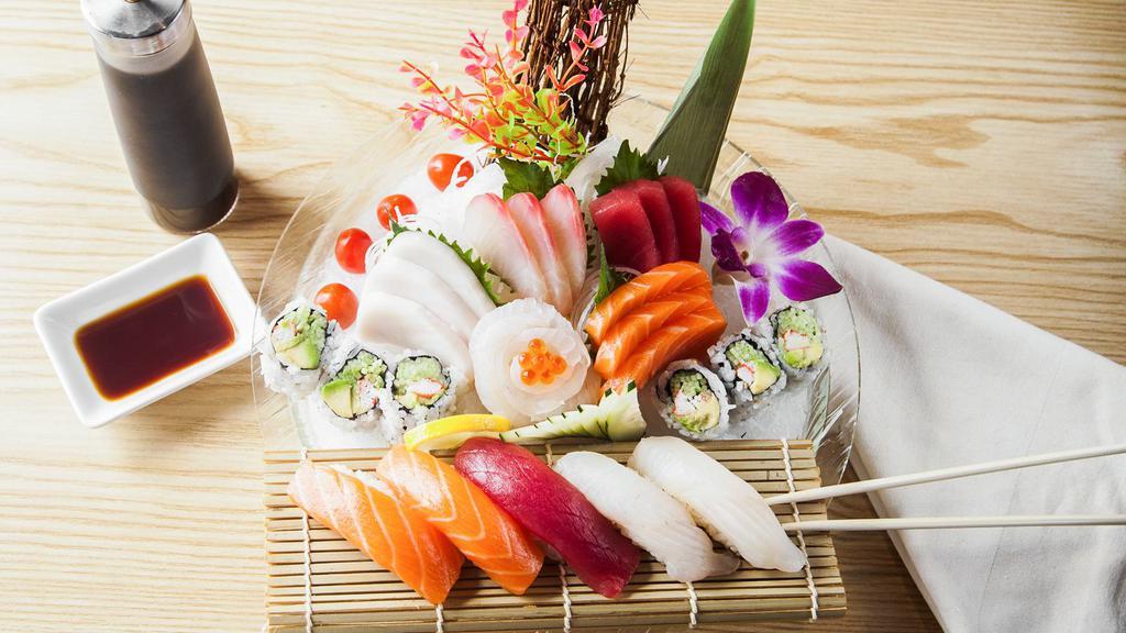 Sushi Sashimi Combo · 5 pieces of sushi, 15 pieces of sashimi, one California roll.
