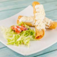 Flautas · Four pieces. Chicken, sour cream, tomatoes, and lettuce.