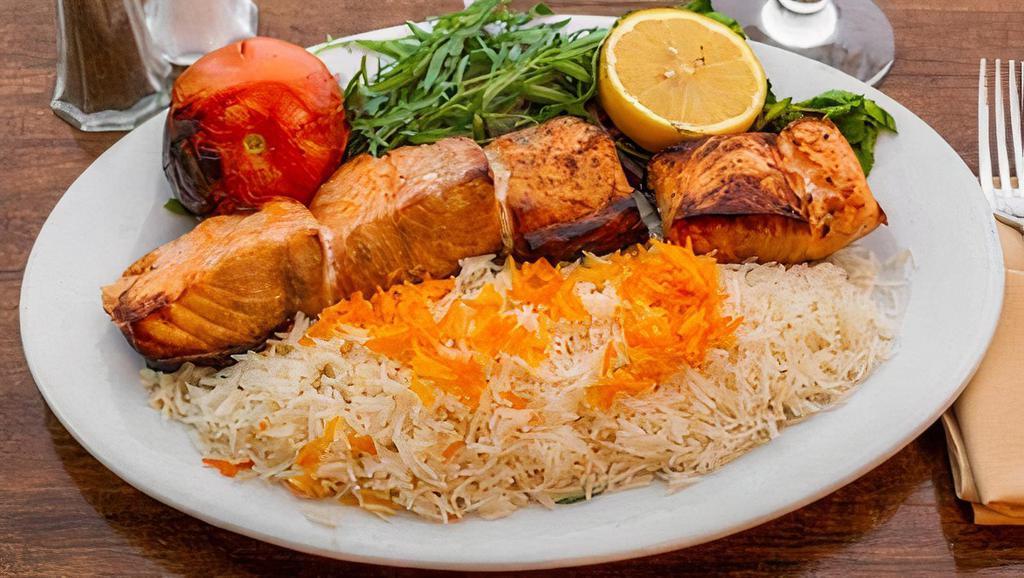 Salmon Kebab · Grilled filet of salmon in a light lemon and saffron vinaigrette.