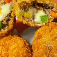 Brisket Roll · Rice paper rolled then panko breaded - 
Fried roll filled with brikset, vegetables, and mozz...