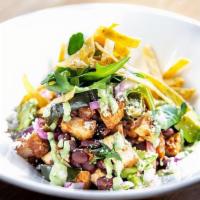 Chipotle-Roasted Chicken · avocado, poblano rajas, cotija cheese, black beans, tortilla strips, chipotle salsa, cilantr...