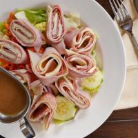 Chef Salad · Ham, turkey, salami and provolone over salad.