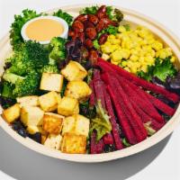 Harvest Salad · mixed greens, sweet corn, pickled beets, broccoli, almonds, ginger tofu, sesame ginger dress...