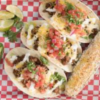 Tacos · Folded crisp tortilla stuffed with beef or chicken and cheese.