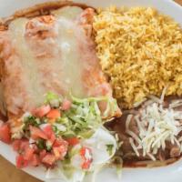 Enchiladas · Soft tortillas, stuffed with chicken, covered with red sauce and melted cheese.