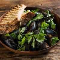 Cozze Al Vino Bianco* · P.E.I. Mussels, white wine, garlic, shallot, parsley, toasted bread. *Consuming raw or under...