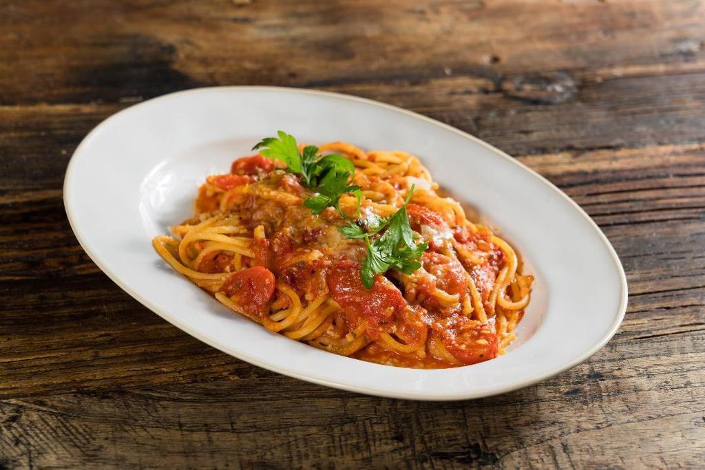 Spaghetti All'Arrabbiata · San Marzano tomato sauce, garlic confit, peperoncino, cherry tomatoes, Parmigiano-Reggiano