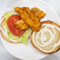 Fish Sandwich · Fried whiting fish seasoned and topped with lettuce and tarter sauce.