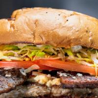 Gyro Burger · A blend of fresh ground lamb and fresh ground turkey feta cheese grilled gyro strips, lettuc...