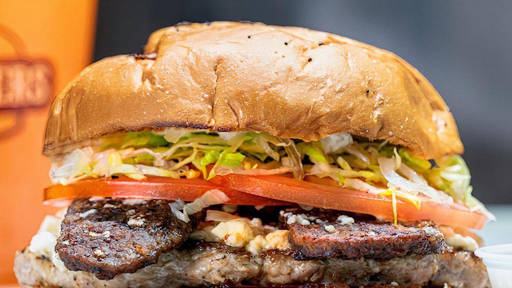 Gyro Burger · A blend of fresh ground lamb and fresh ground turkey feta cheese grilled gyro strips, lettuce, tomato, red onion & tzatziki sauce a Miami onion bun.