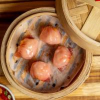 Shrimp & Bamboo Dumplings · Served with our House Soy Sauce.