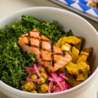 Salmon Bowl · radish, lemon tahini kale, chermoula marinated chick pea, pickled onions, quinoa