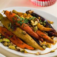Harissa Roasted Carrots · Pistachio, labne