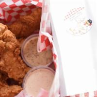 Buttermilk Chicken Tenders · Plain or Nashville hot. 
Alabama white bbq sauce and honey mustard.