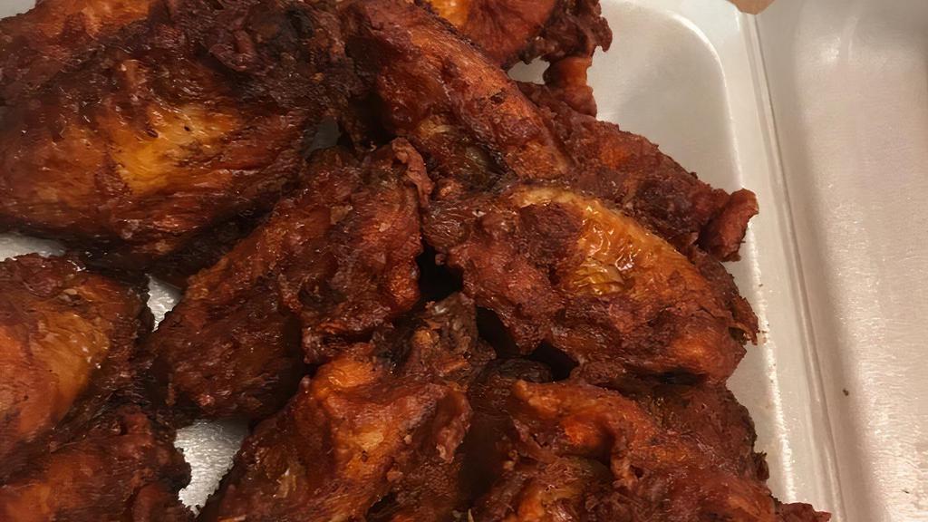 Side Of Fried Chicken Wings (10 Pieces) · Spicy. Hot fried chicken wings.