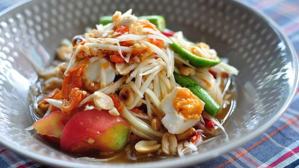 Tum Thai Kai Kem · Thai spicy papaya salad with salted egg. *Contain Peanuts.