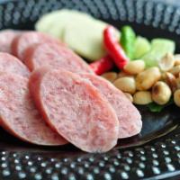 Nam Sod · Marinated raw pork sausages.
