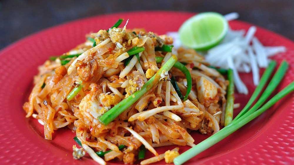 Spicy Pad Thai With Choice Of Meat · Stir-fried noodles with tamarind and fish sauce base with choice of meats and eggs.