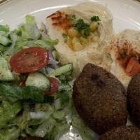 Myrna’S Combo Platter · Hummus, baba ghannuj, kibbe, falafel and Mediterranean salad.