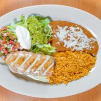 Chimichanga · A flour tortillas stuffed with your choice chunks of beef or spicy chicken, then deep fried ...