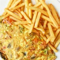 Western Omelette · Onions, peppers, ham. Served with toast and home fries or French fries.
