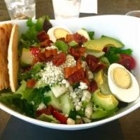 Cobb Salad · Mixed field greens, avocado, bacon, tomato, cucumber, boiled egg, bleu cheese and green apple.