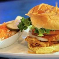Spicy Buffalo Chicken Sandwich · Crispy fried chicken breast in buffalo sauce on a brioche bun with lettuce and blue cheese d...