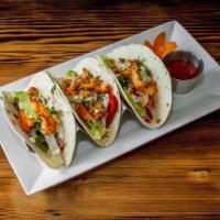 Tacos - Tandoori Chicken - 3 Pcs · Chicken tikka, sauteed peppers, onions and special sauce on a warm tortilla